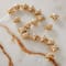 12 Packs: 18 ct. (216 total) Gold Metal Star Beads, 11mm by Bead Landing™